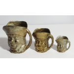 Toby Jugs van koper (3 stuks) 